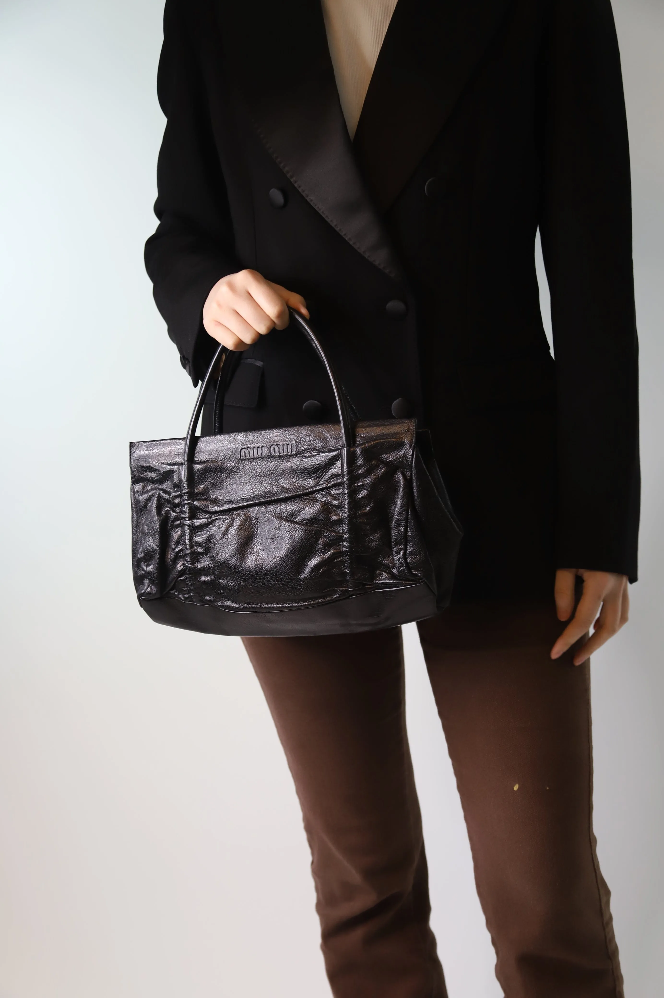 Black leather top handle bag